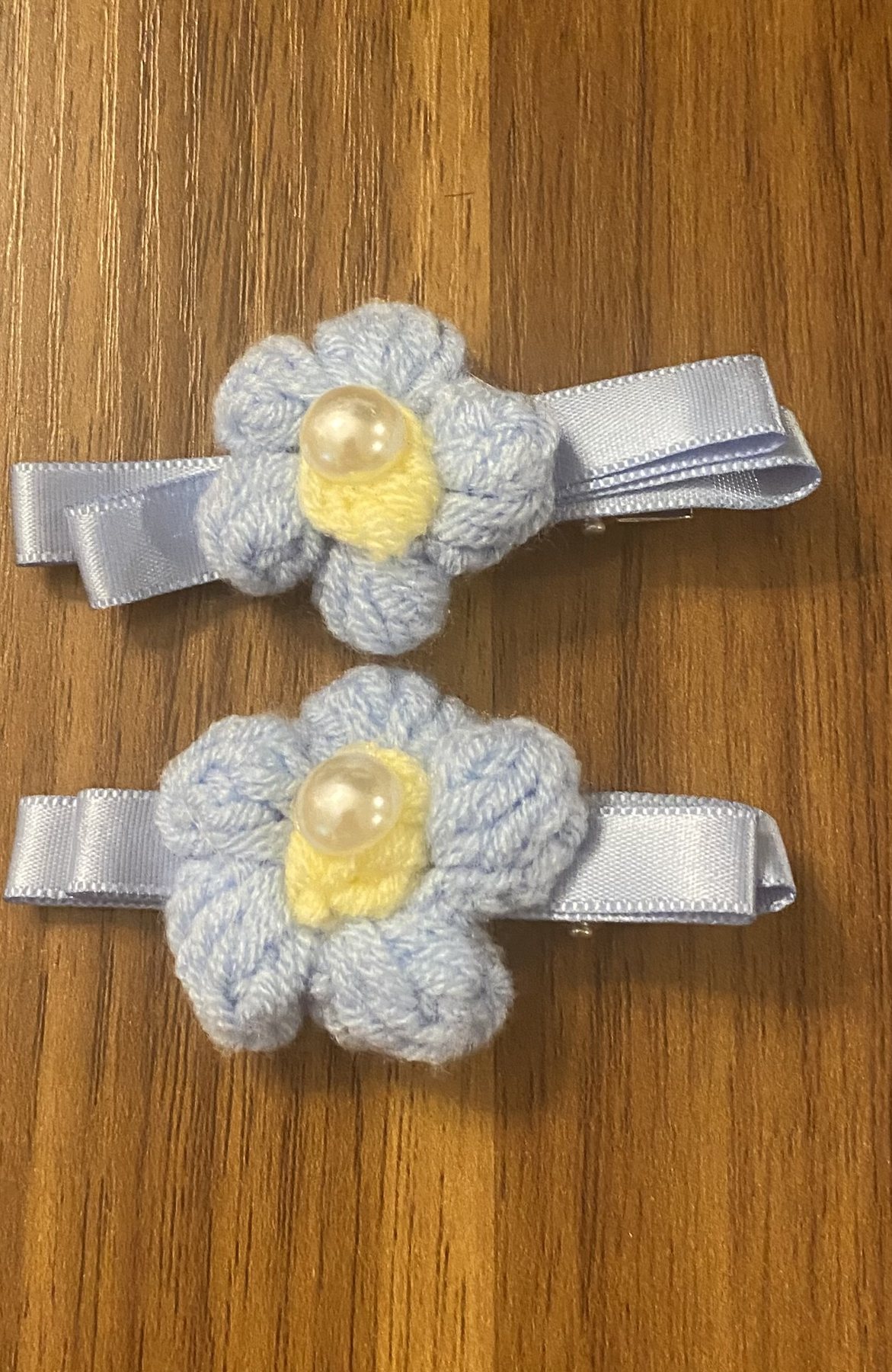 Light blue crochet flower clips